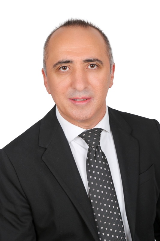 Portrait of Dr. Yunus Özen